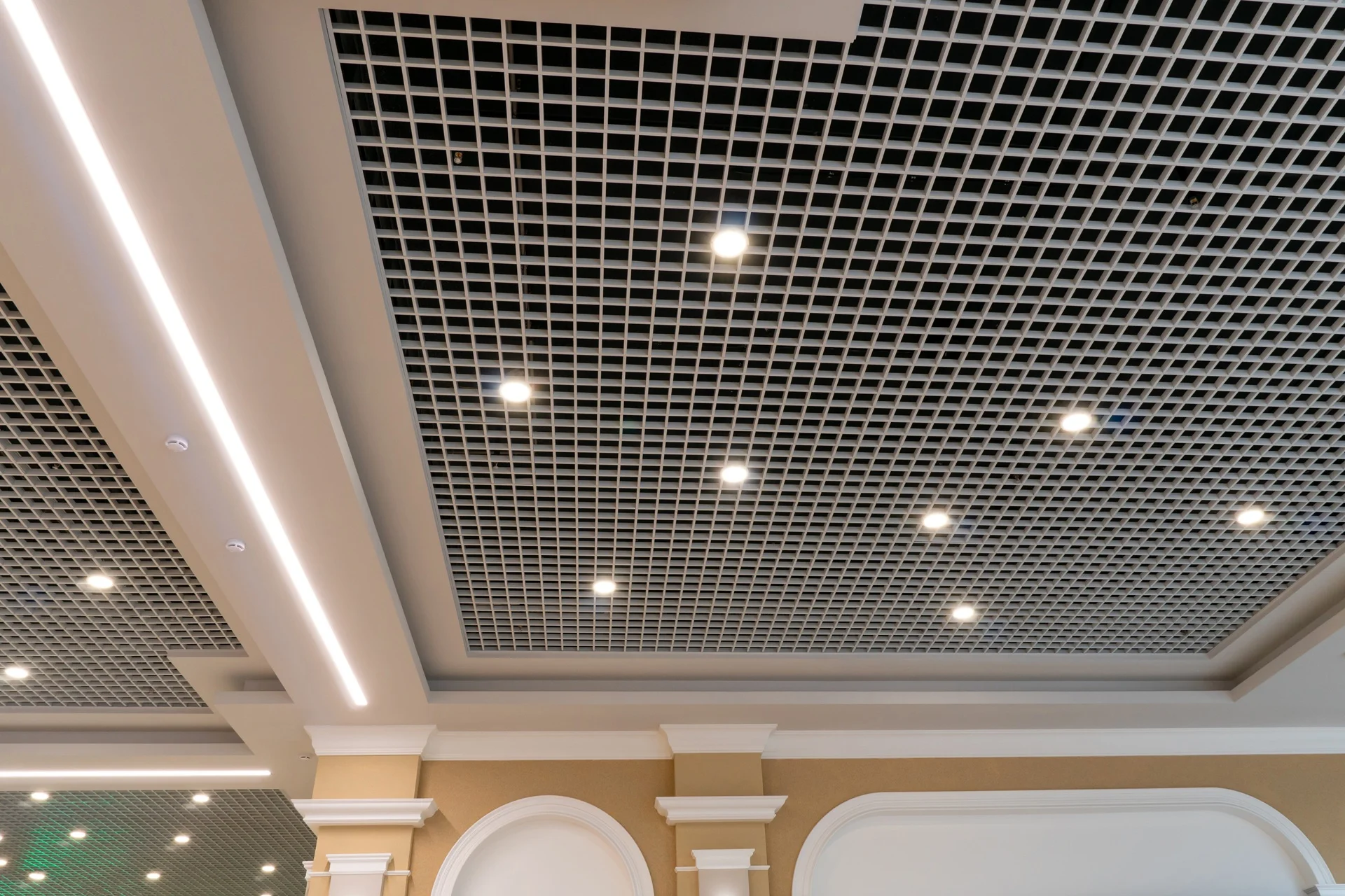 Exposed grid ceiling with lighting